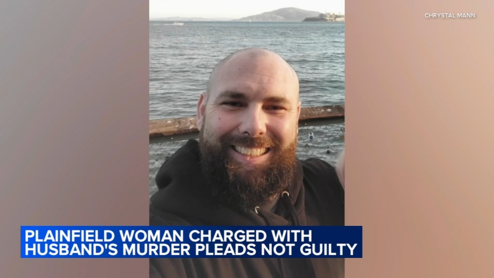 Suburban woman charged in husband's dismemberment pleads not guilty