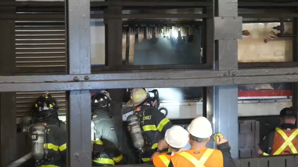 Smoke pours through Astor Place station after train fire injures 12