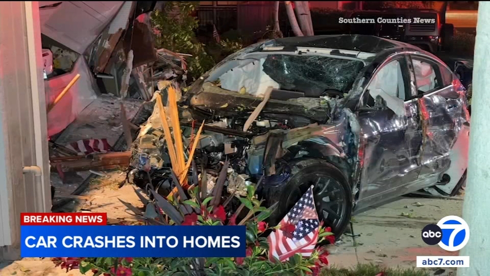 Out-of-control Tesla crashes into homes in OC neighborhood