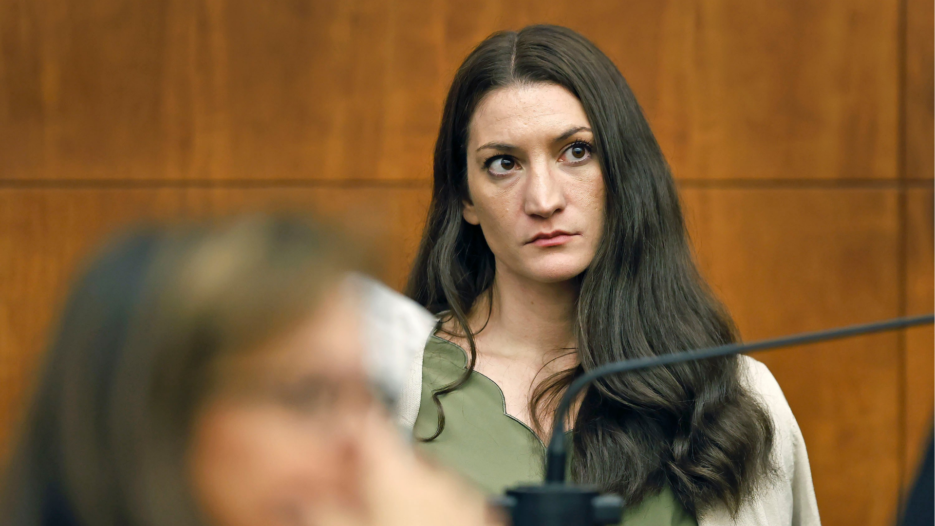 Lindsay Clancy waits for the judge to call a prospective jury member into court in her murder trial where she is charged in the 2023 killing of her three children, Wednesday, July 22, 2026, in Plymouth Superior Court in Plymouth, Mass.