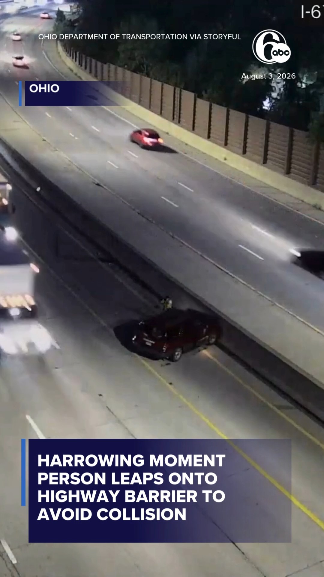 Harrowing Moment Person Leaps Onto Highway Barrier to Avoid Collision