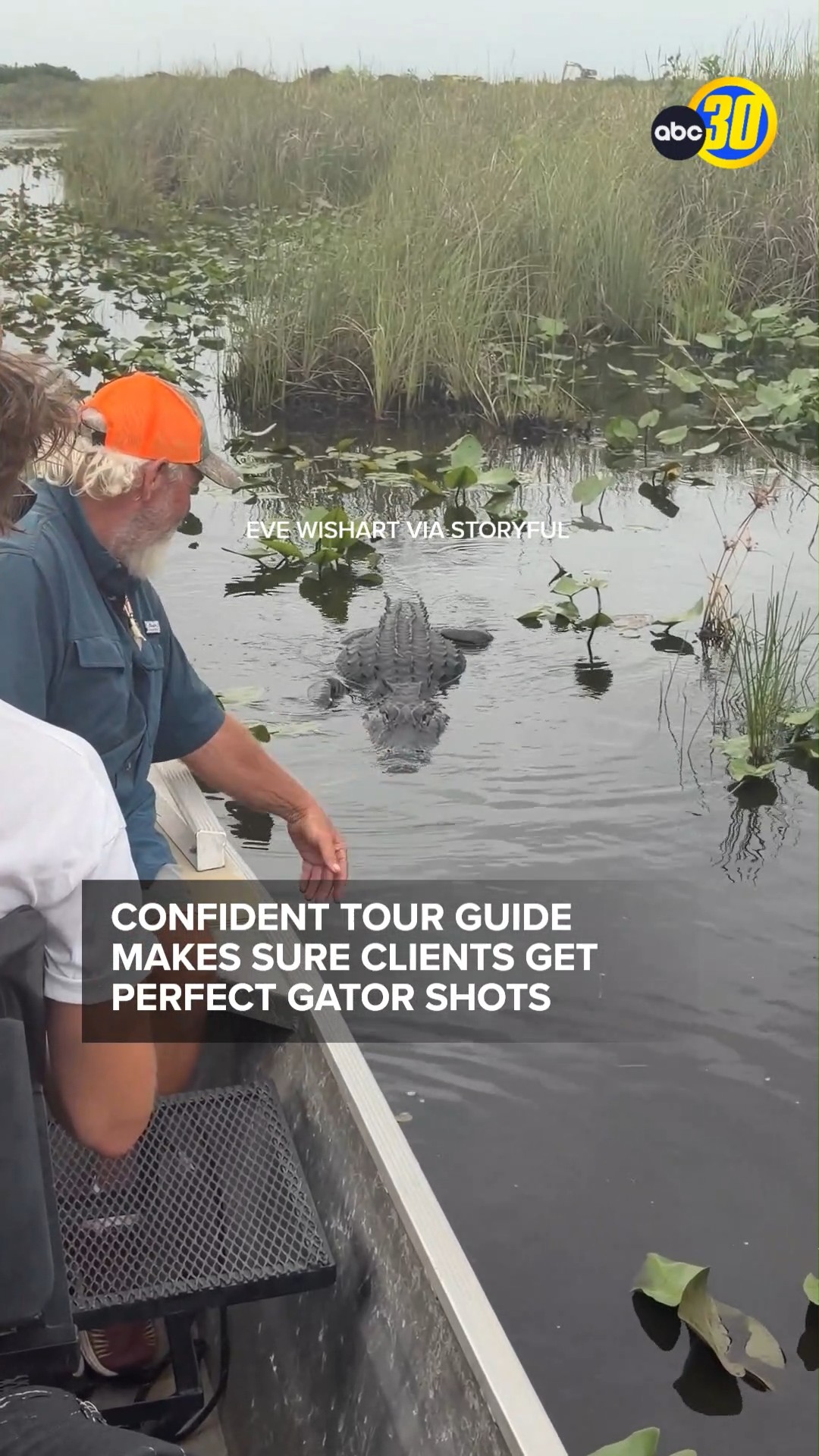 Confident tour guide makes sure clients get perfect gator shots