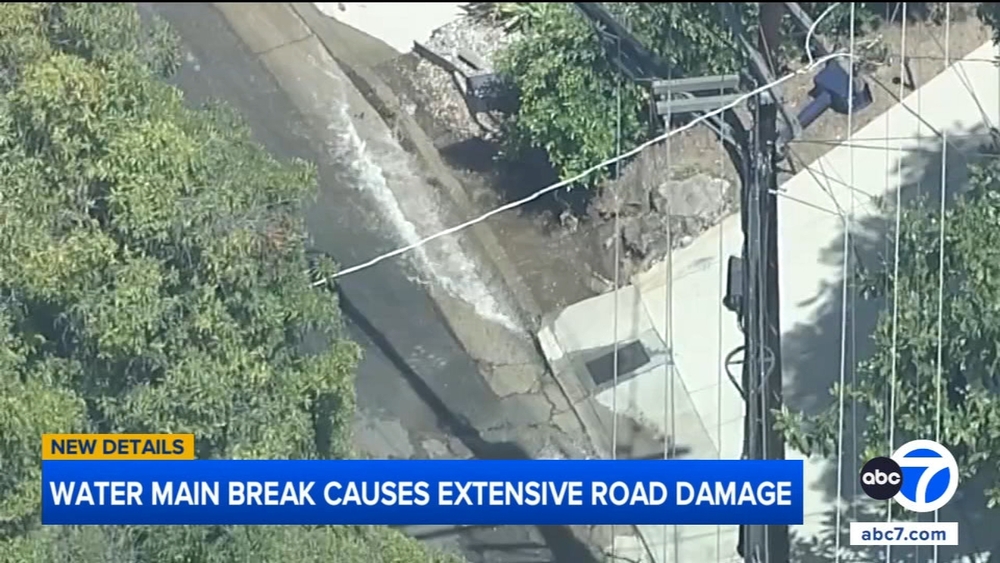 Hollywood Hills water main break leaves road damage, muddy cleanup