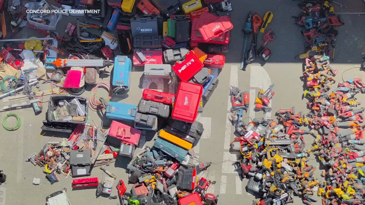 A collection of stolen tools confiscated by police during a theft ring investigation.