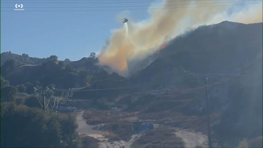 Evacuation orders issued for fast-moving fire in Santa Clarita