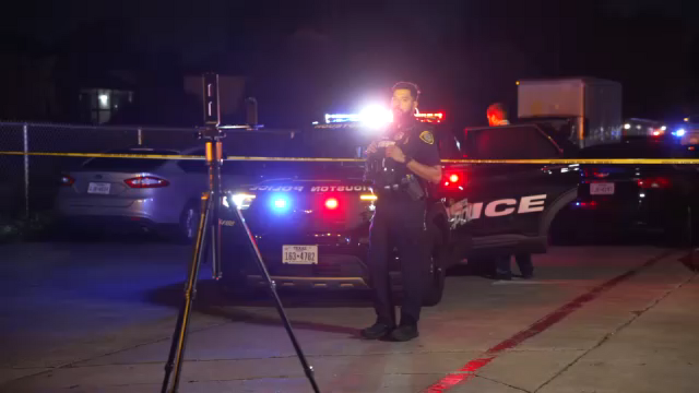 Suspect killed by officers in parking garage where man was found shot to death, HPD says