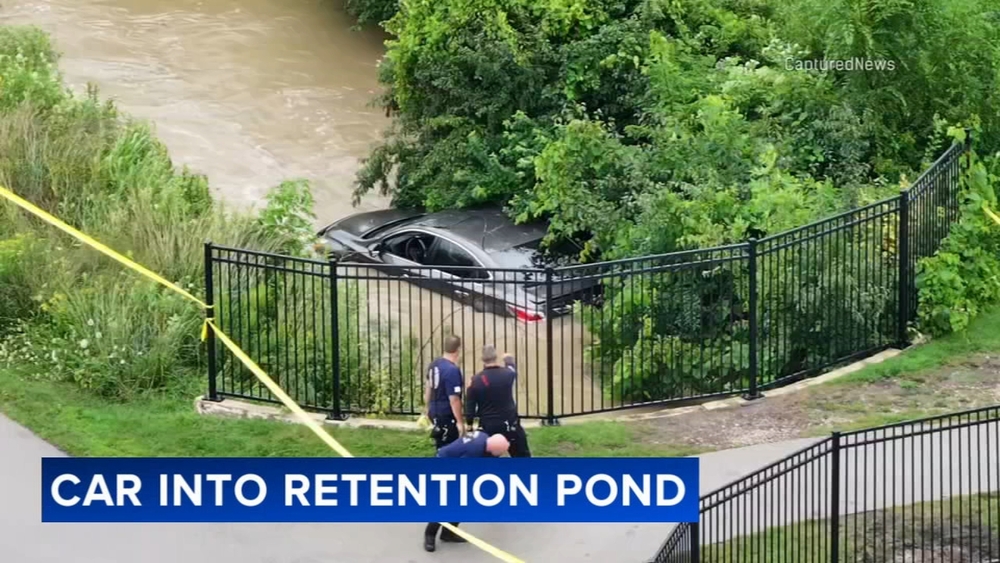 Car crashes into pond as strong storms batter Chicago area