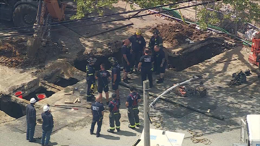 Chopper over worker trapped in 7-foot-deep hole