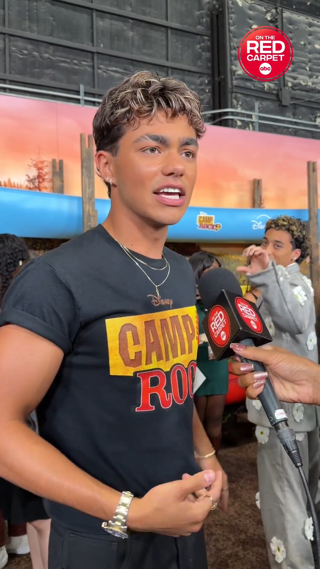 Malachi Barton is surprised mid-interview by his co-stars