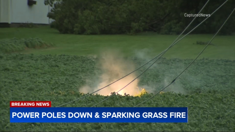 Downed power poles appear to spark small grass fire in Oswego, Illinois