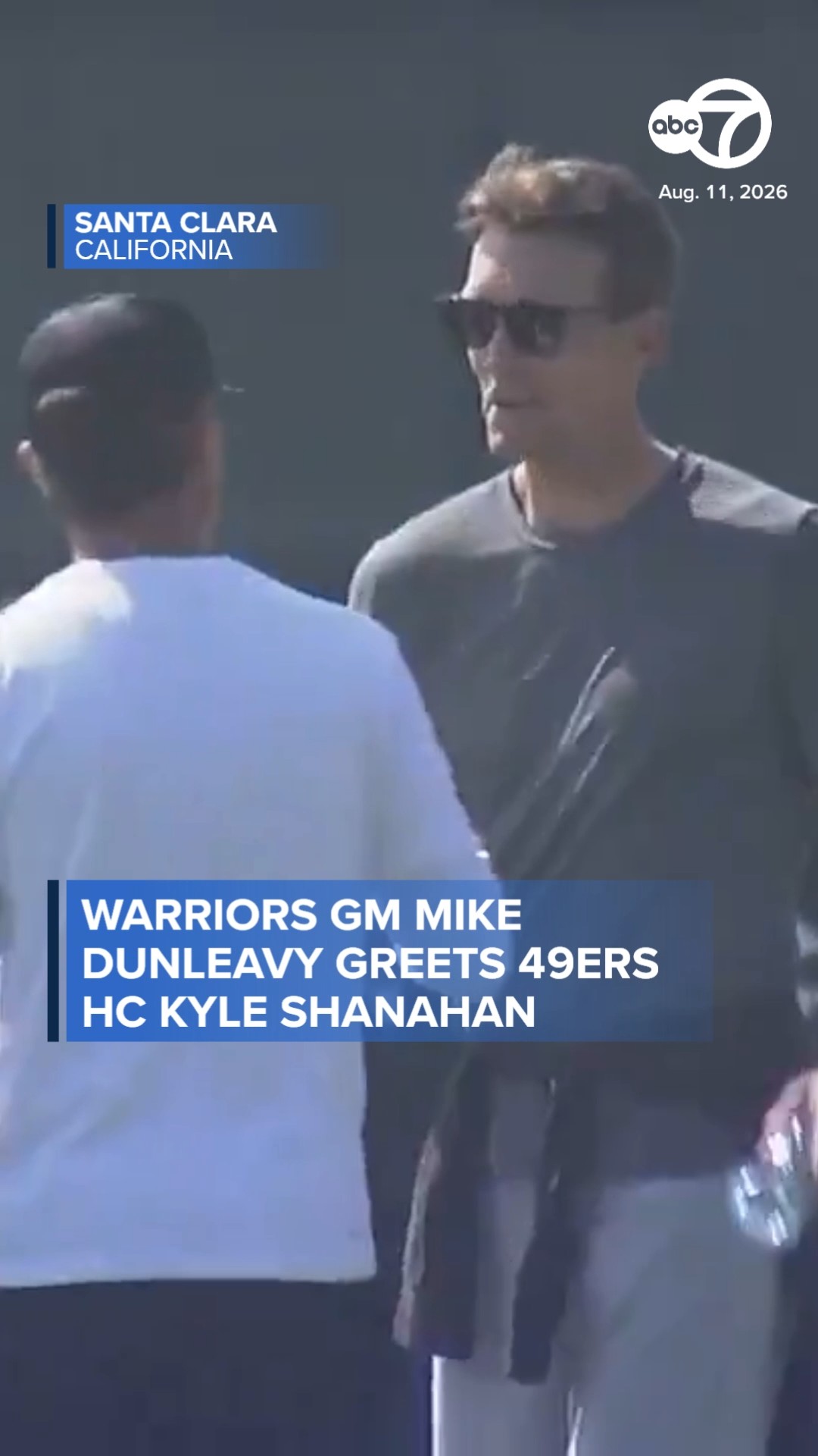 Warriors GM Mike Dunleavy greets 49ers HC Kyle Shanahan