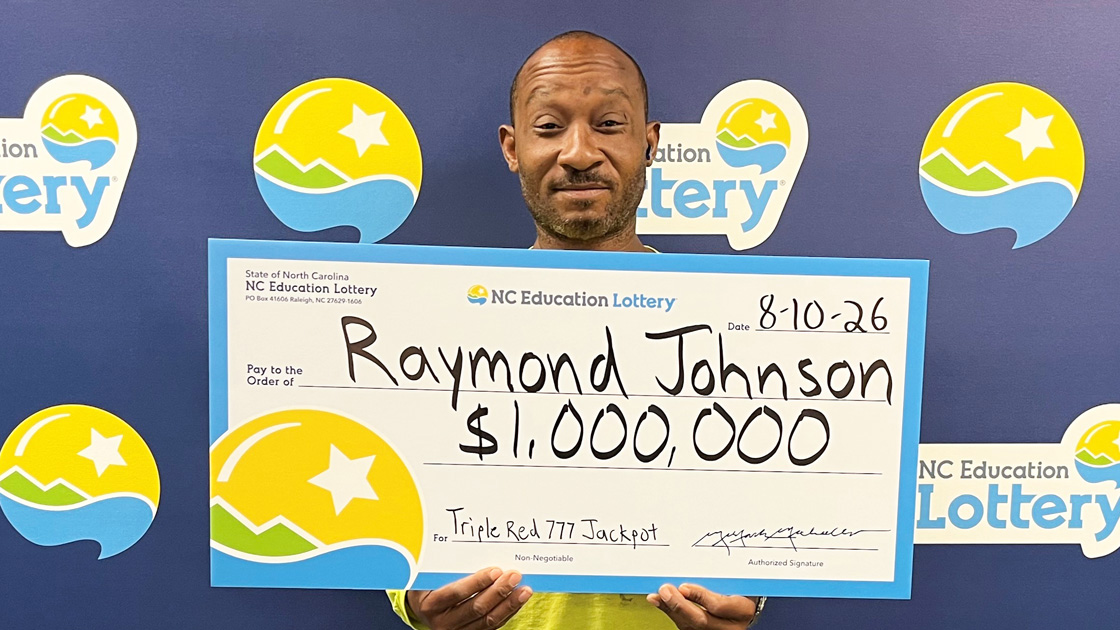 Raymond Johnson poses with his big prize.