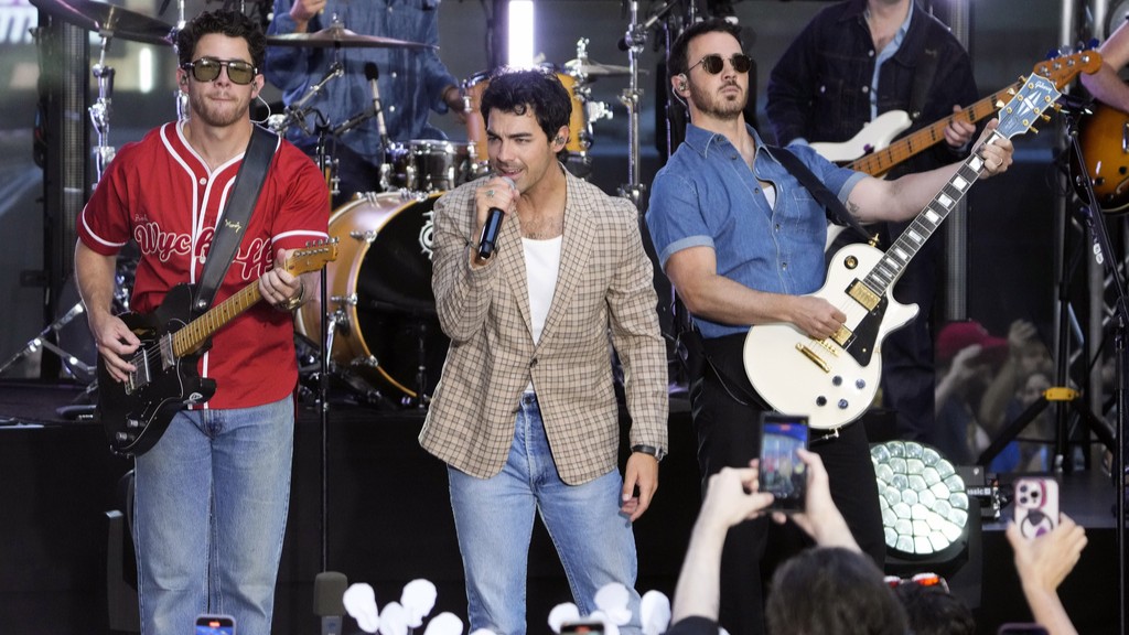 Nick Jonas, from left, Joe Jonas and Kevin Jonas from the Jonas Brothers perform on NBC's Today show at Rockefeller Plaza on Friday, Aug. 8, 2025, in New York.