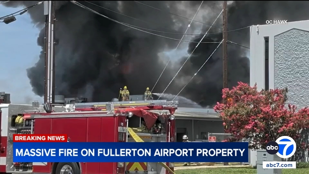 Building fire near Fullerton Airport temporarily halts operations