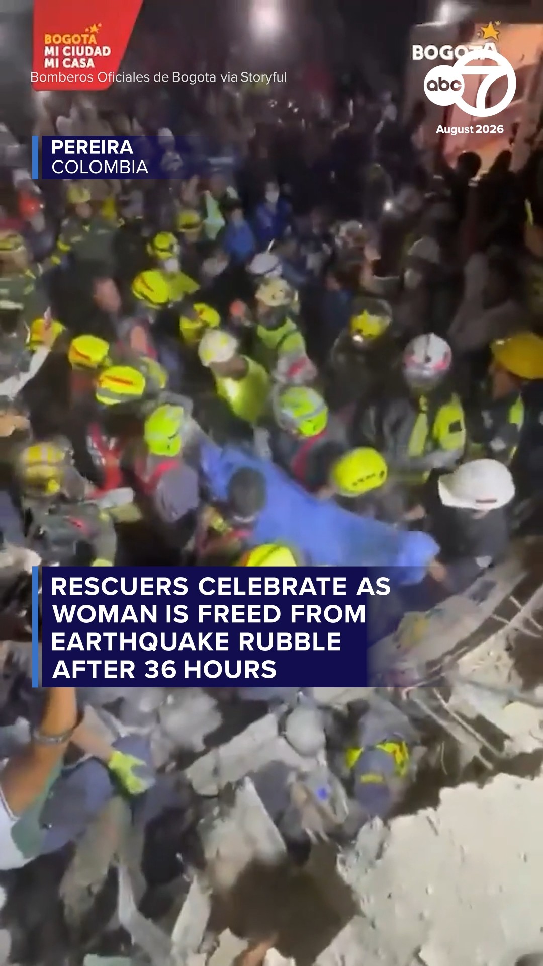 Rescuers celebrate as woman is freed from earthquake rubble