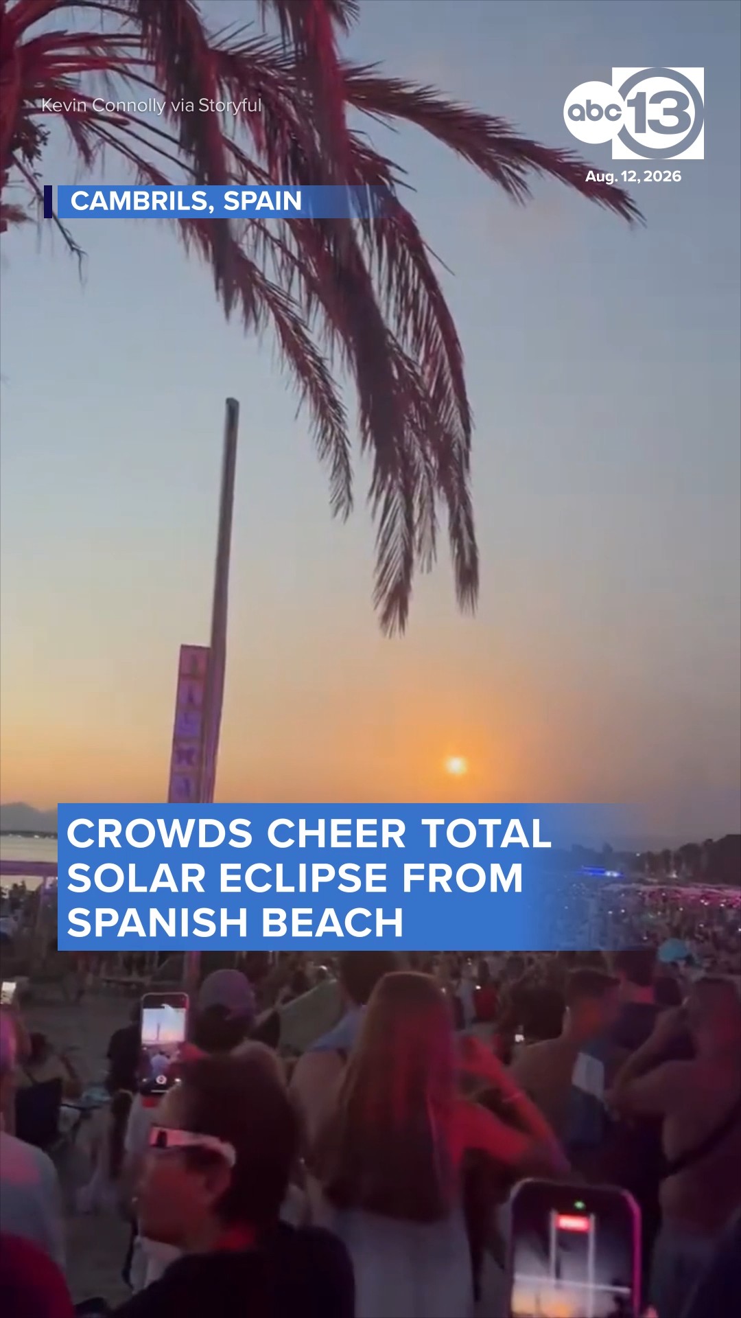 Crowds cheer total solar eclipse from Spanish beach
