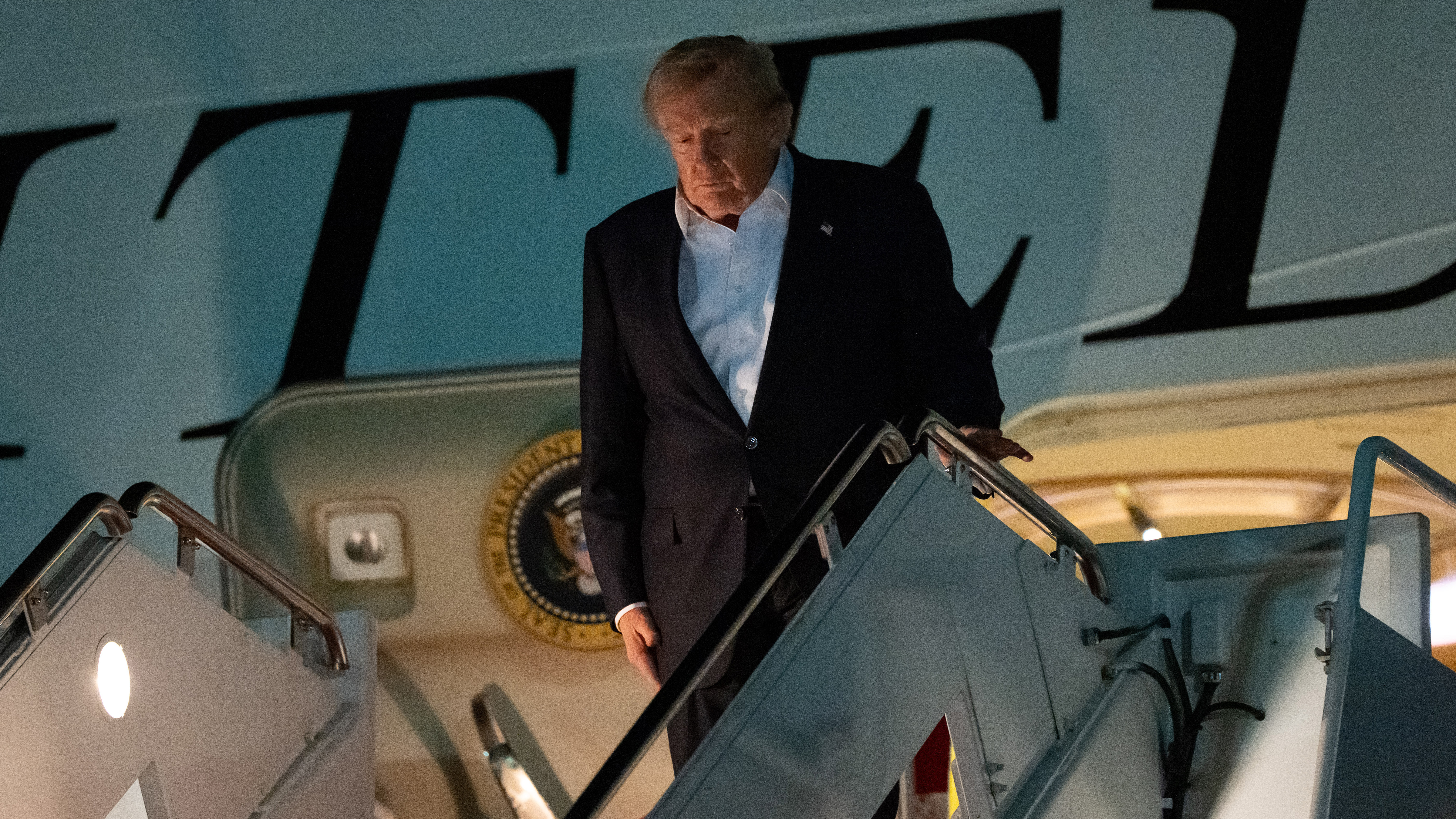 President Donald Trump waves as he arrives on Air Force One, Thursday, July 9, 2026, at Joint Base Andrews, Md. 