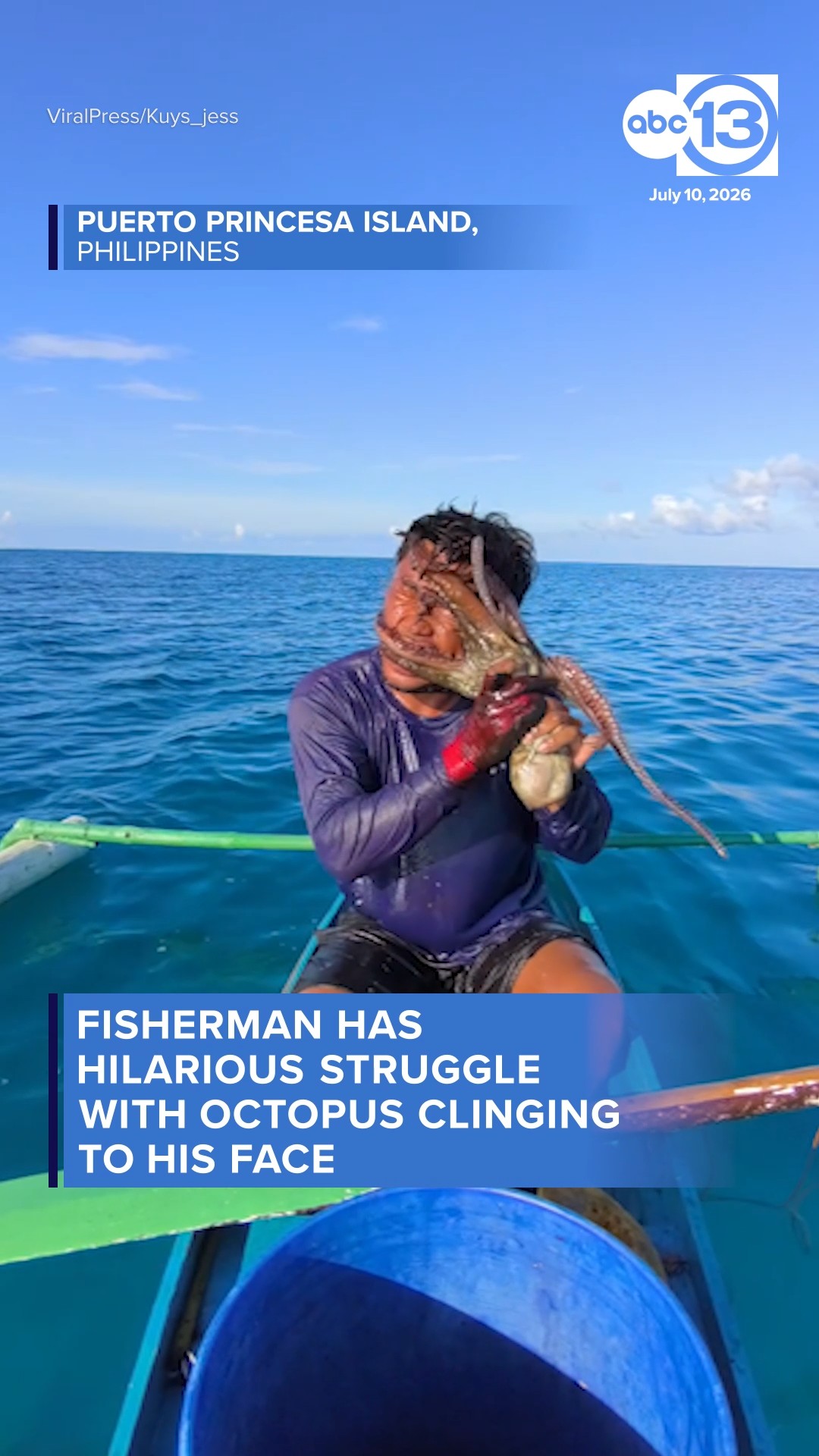 Fisherman struggles with octopus clinging to his face