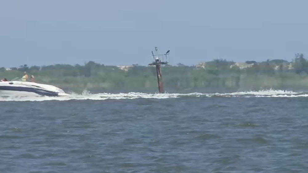 Grandfather charged in boat crash that killed grandkids