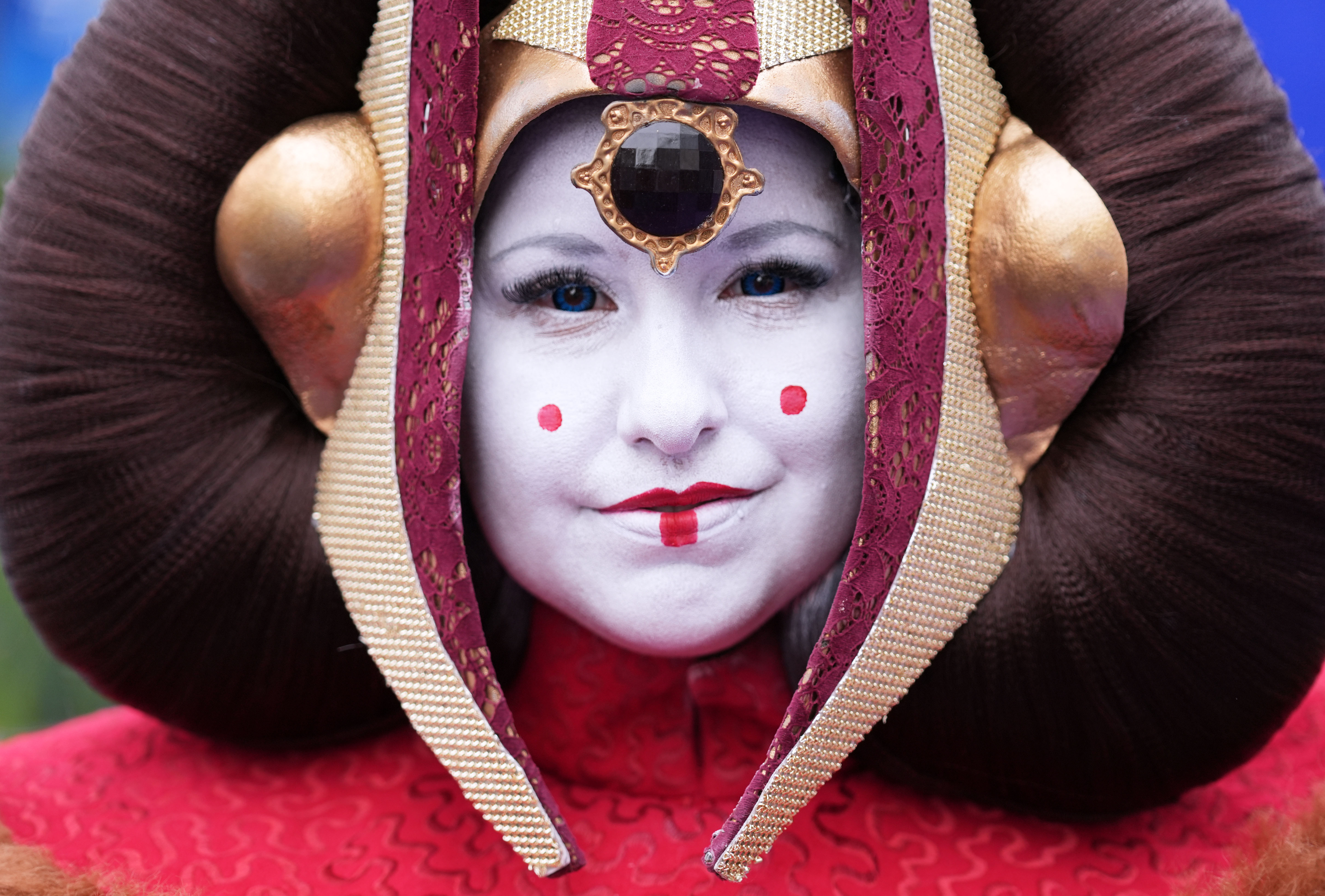 Rachel Ibarra of San Dimas, Calif., dressed as Queen Amidala from the "Star Wars" franchise, poses during D23 in Anaheim, Calif., Friday, Aug. 14, 2026.
