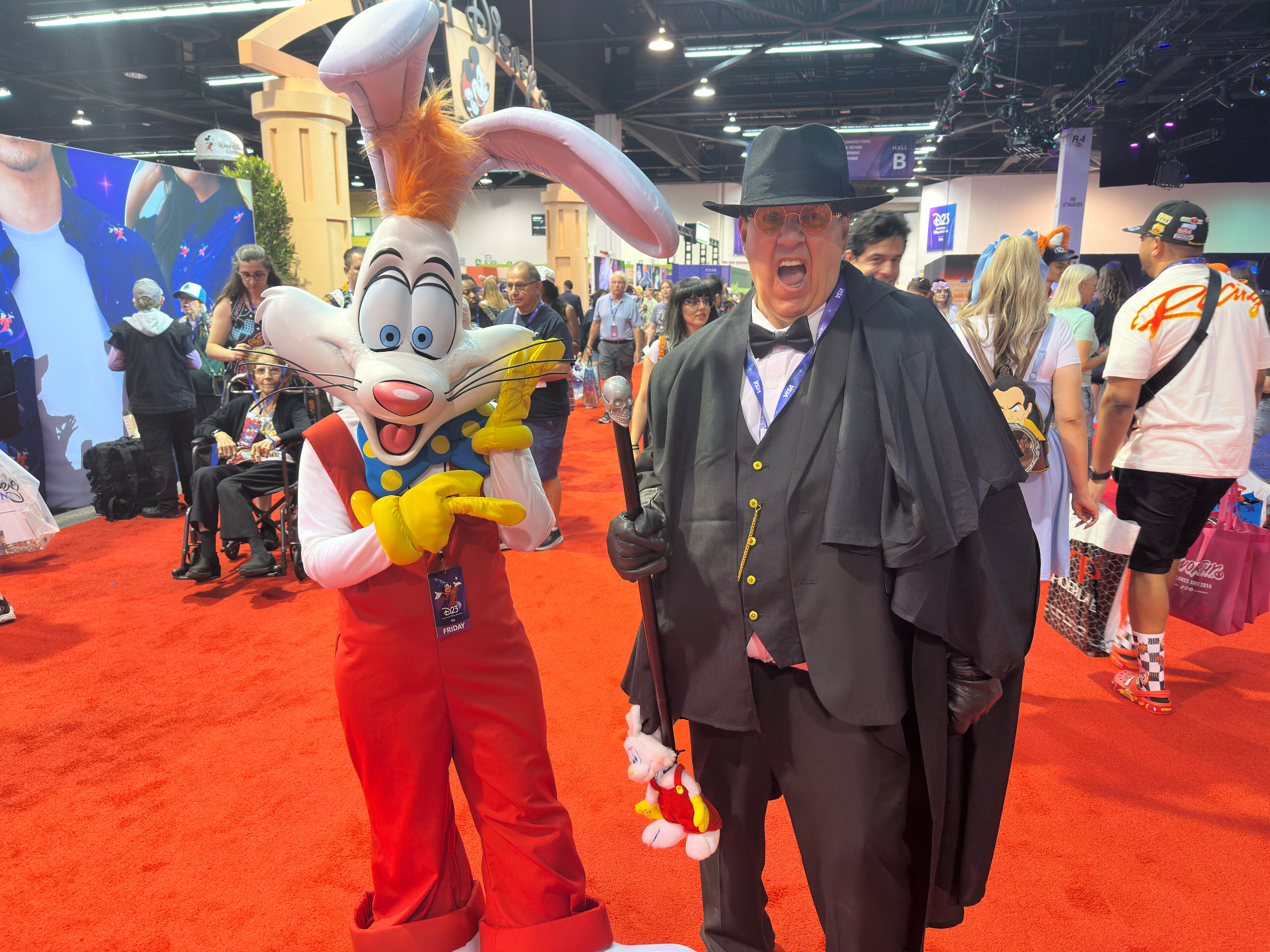 D23 attendees are seen dressed up as Roger Rabbit and Judge Doom on Friday, Aug. 14, 2026 in Anaheim, Calif.