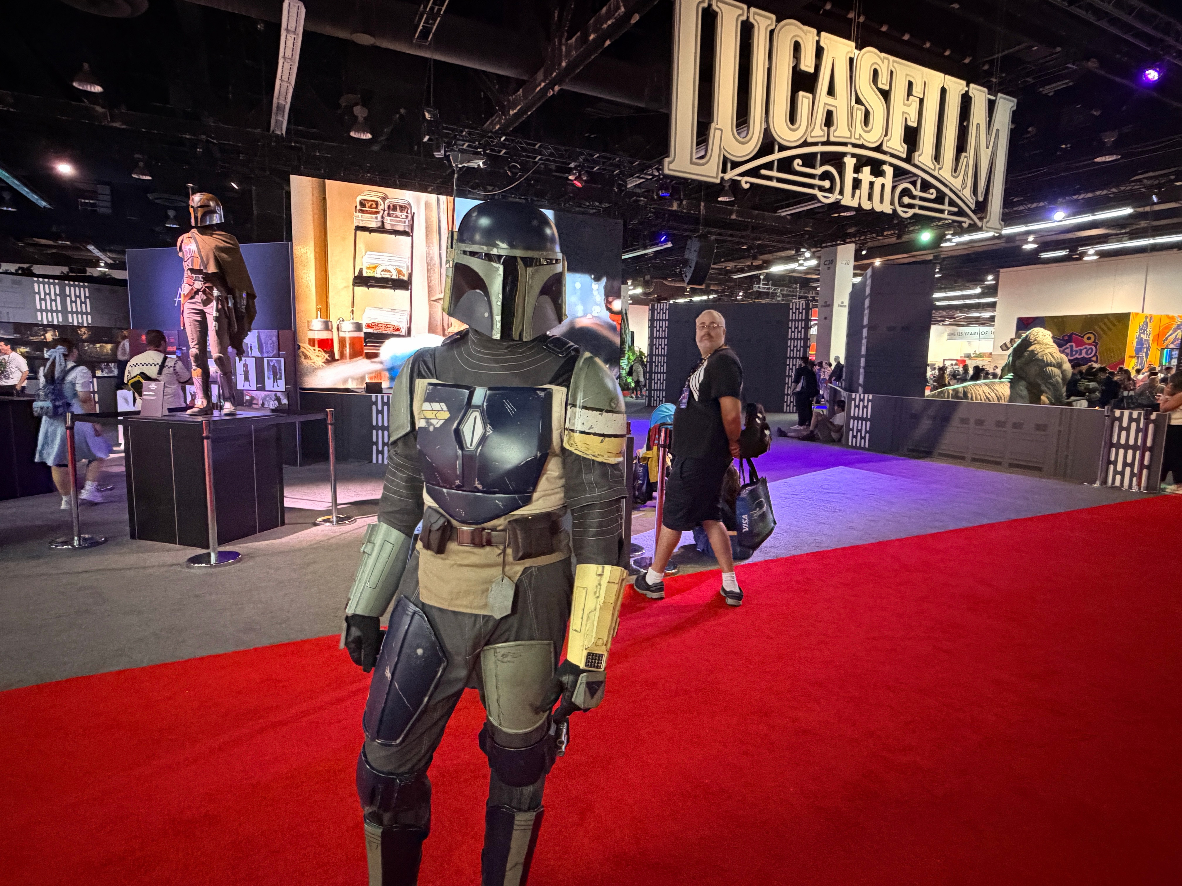 Michael Kinnear from from San Diego, Calif. is seen cosplaying as The Mandalorian at D23 in Anaheim, Calif. on Friday, Aug. 14, 2026.