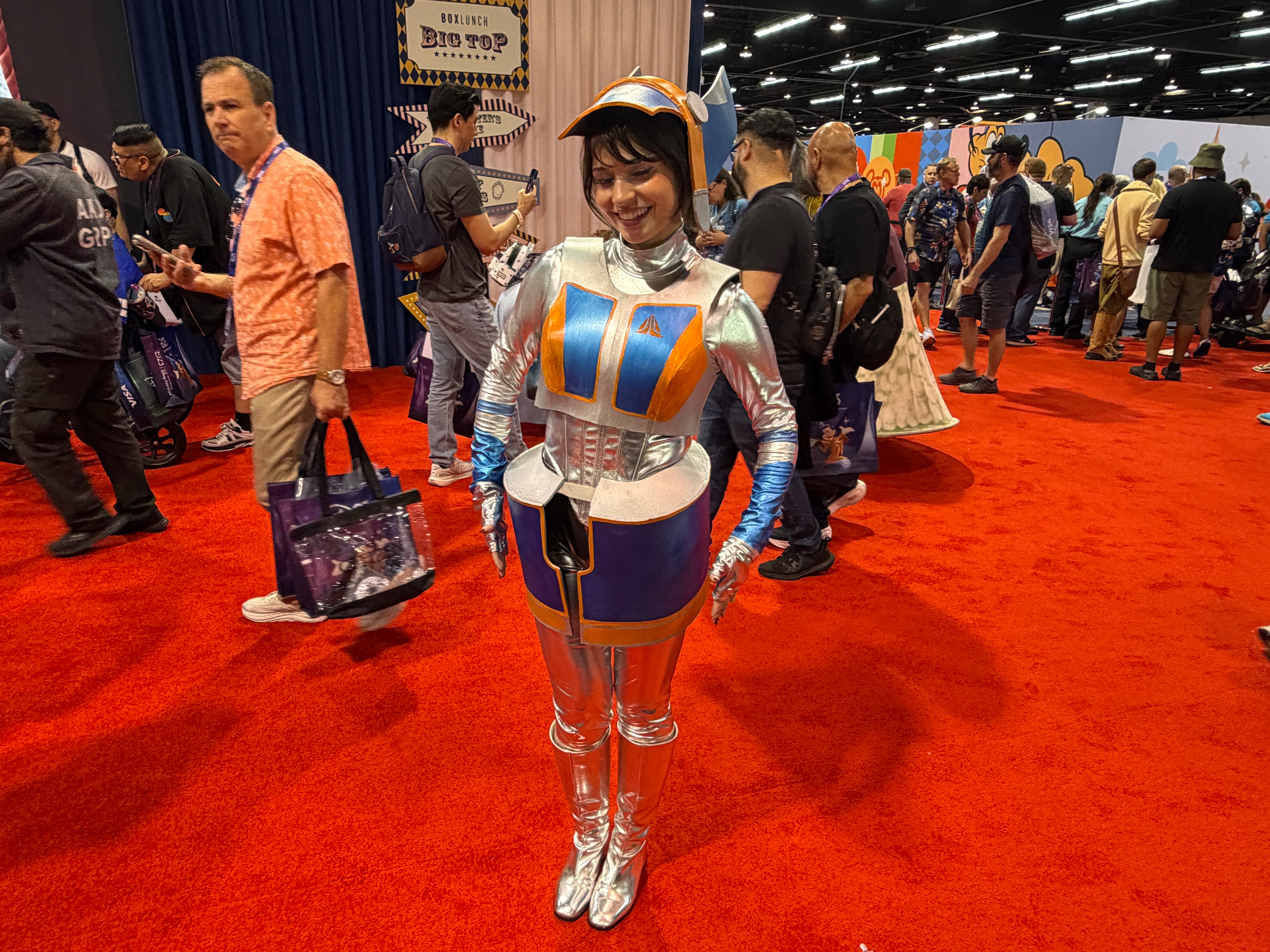 She went niche! Meg from Orlando, Fl dressed as "Star Wars" waitress droid/spokesbot Aly San San at D23 in Anaheim, Calif. on Friday, Aug. 14, 2026.