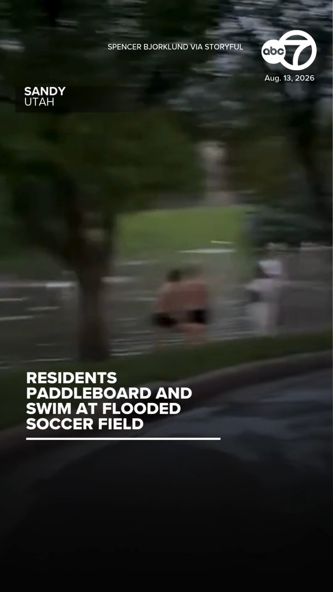 Residents paddleboard and swim at flooded soccer field in Utah
