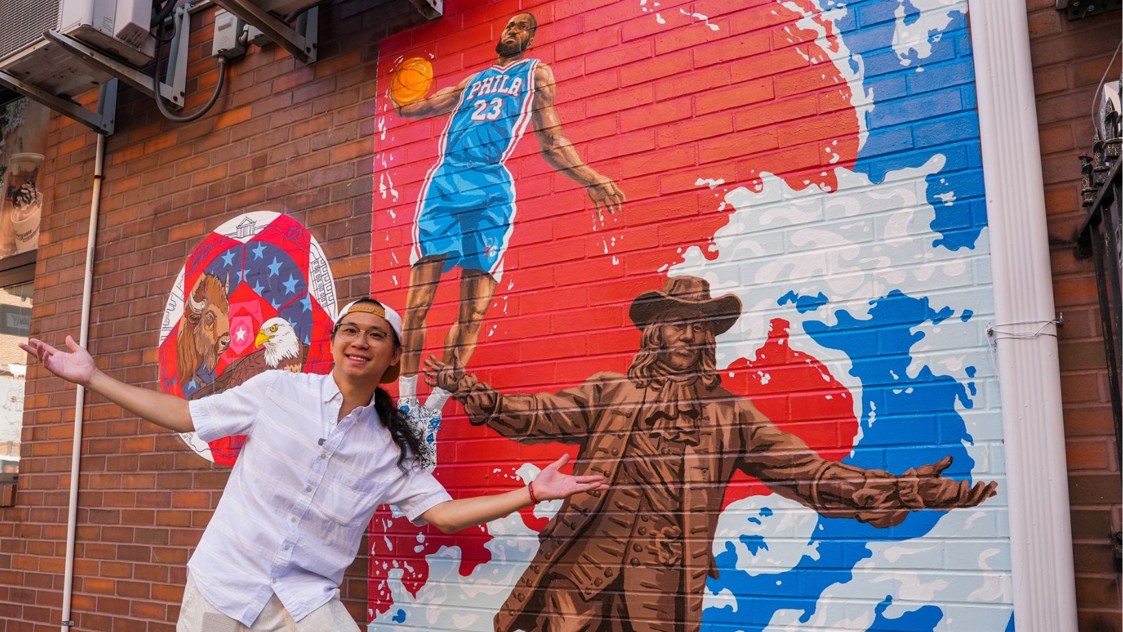 Chinatown artist paints Philly icons in mural featuring LeBron James