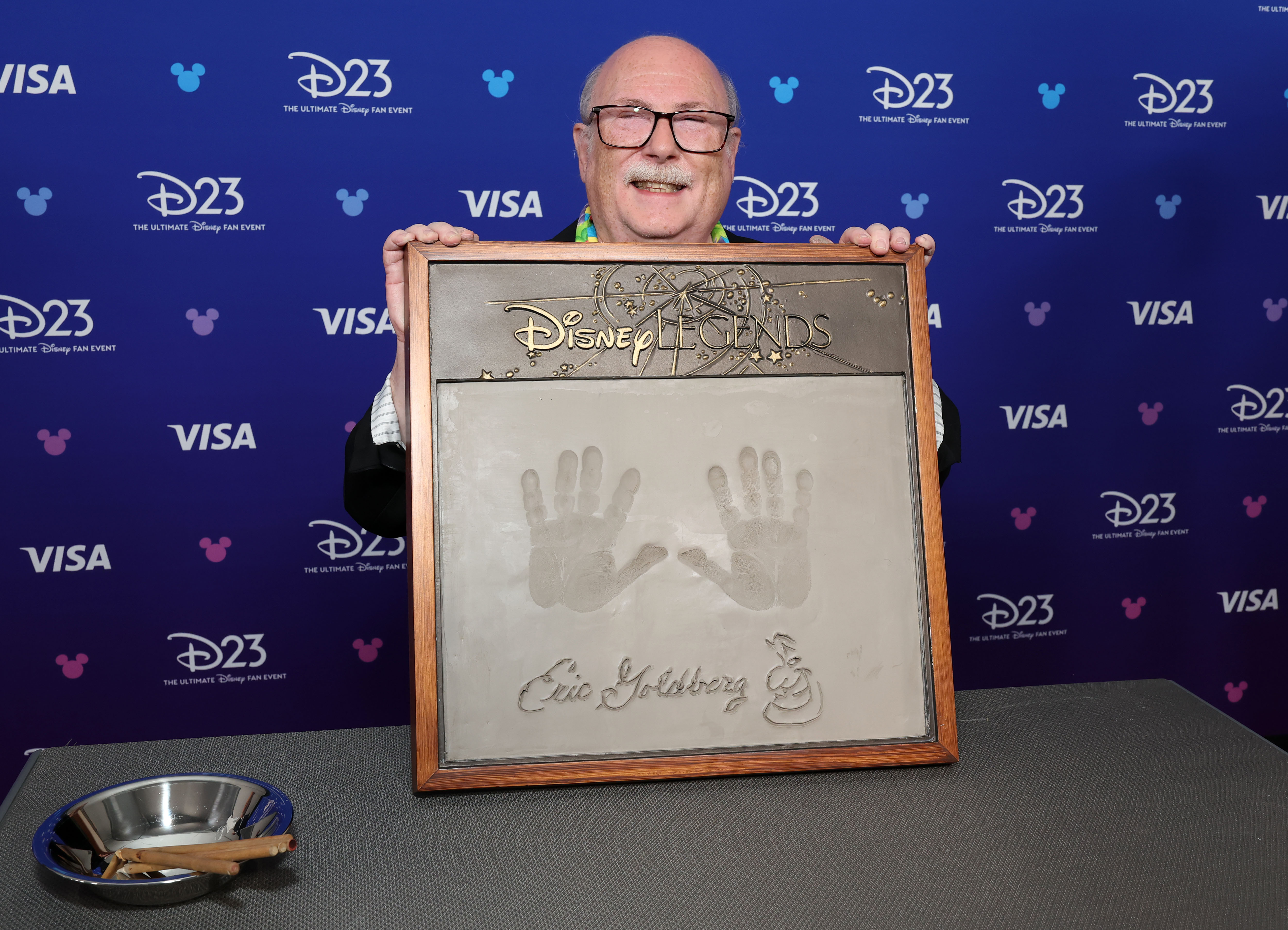 Eric Goldberg gets his handprints done at D23 on August 16, 2026 in Anaheim, California.