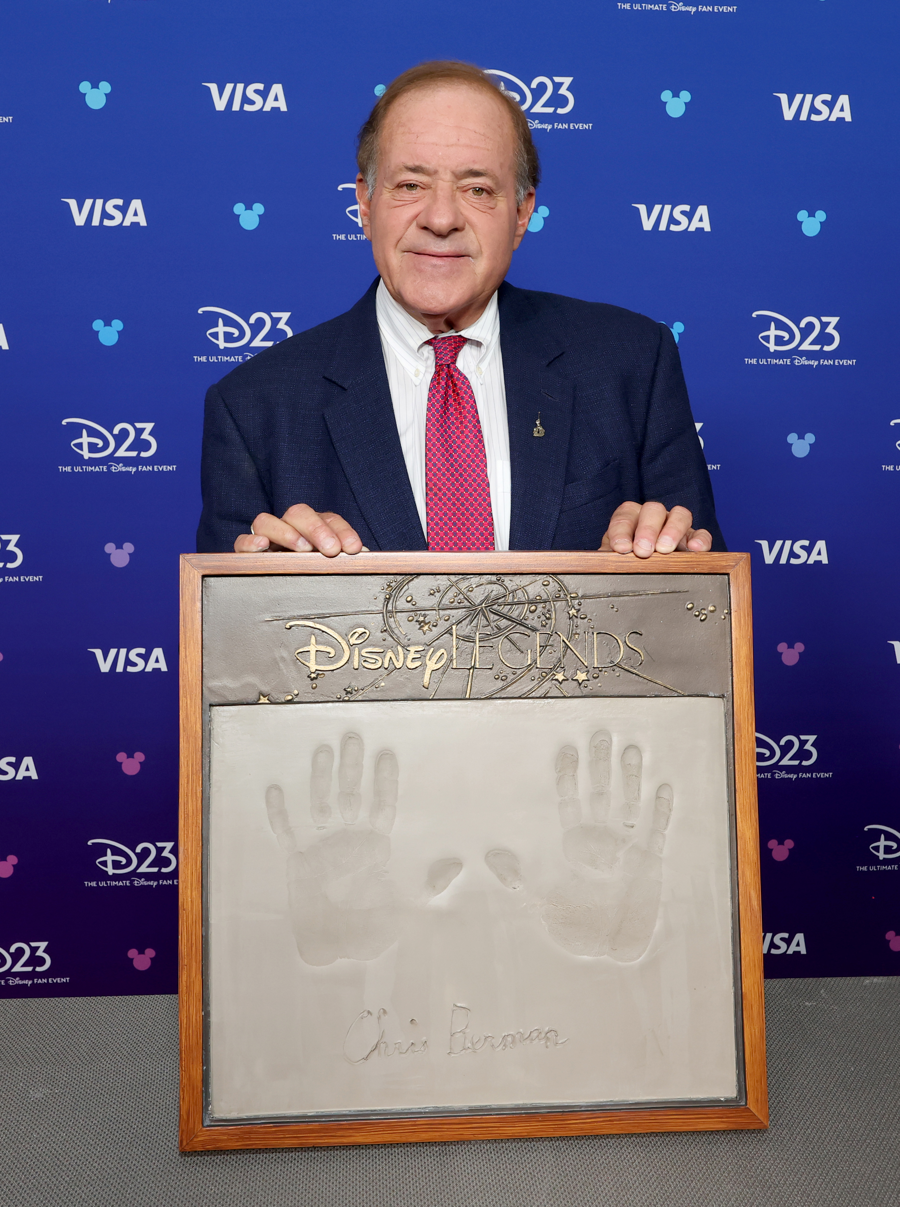 Chris Berman gets his handprints done at D23 on August 16, 2026 in Anaheim, California.