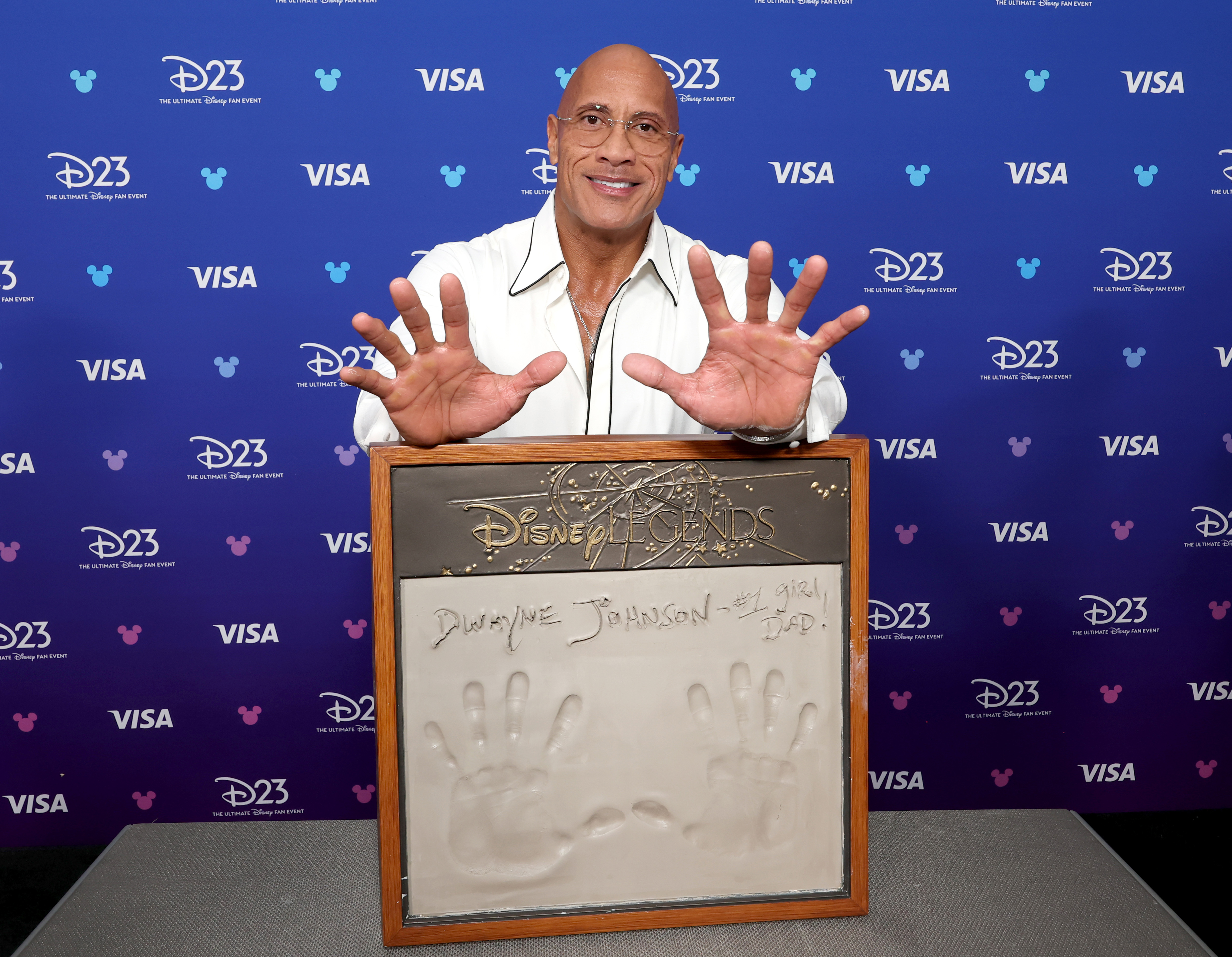 Dwayne Johnson gets his handprints at D23 on August 16, 2026 in Anaheim, California.