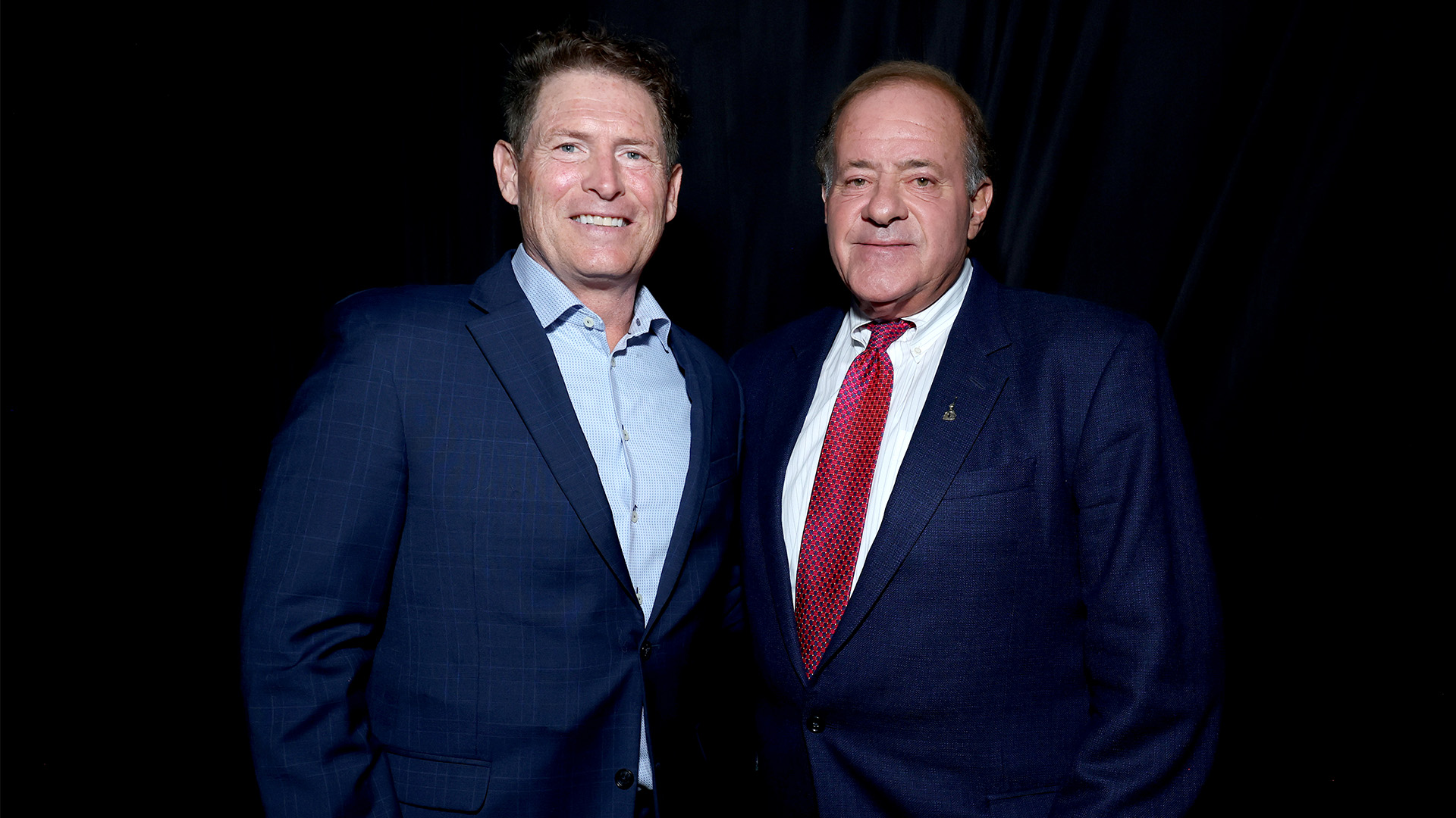 Steve Young and Chris Berman are seen at D23's Disney Legends Award Ceremony on August 16, 2026 in Anaheim, California.