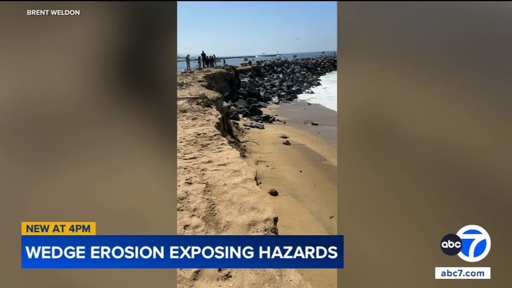Coastal erosion at The Wedge exposes pipes, wires after summer swells