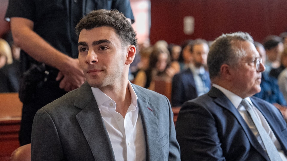 Mangione state murder trial delayed as dismissal fight begins