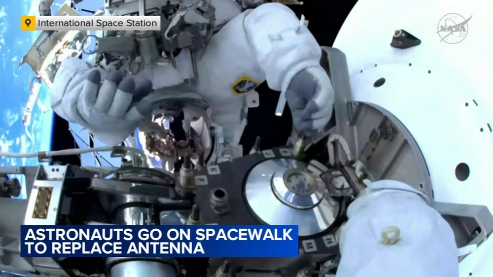 Astronauts go on spacewalk to replace antenna outside International Space Station