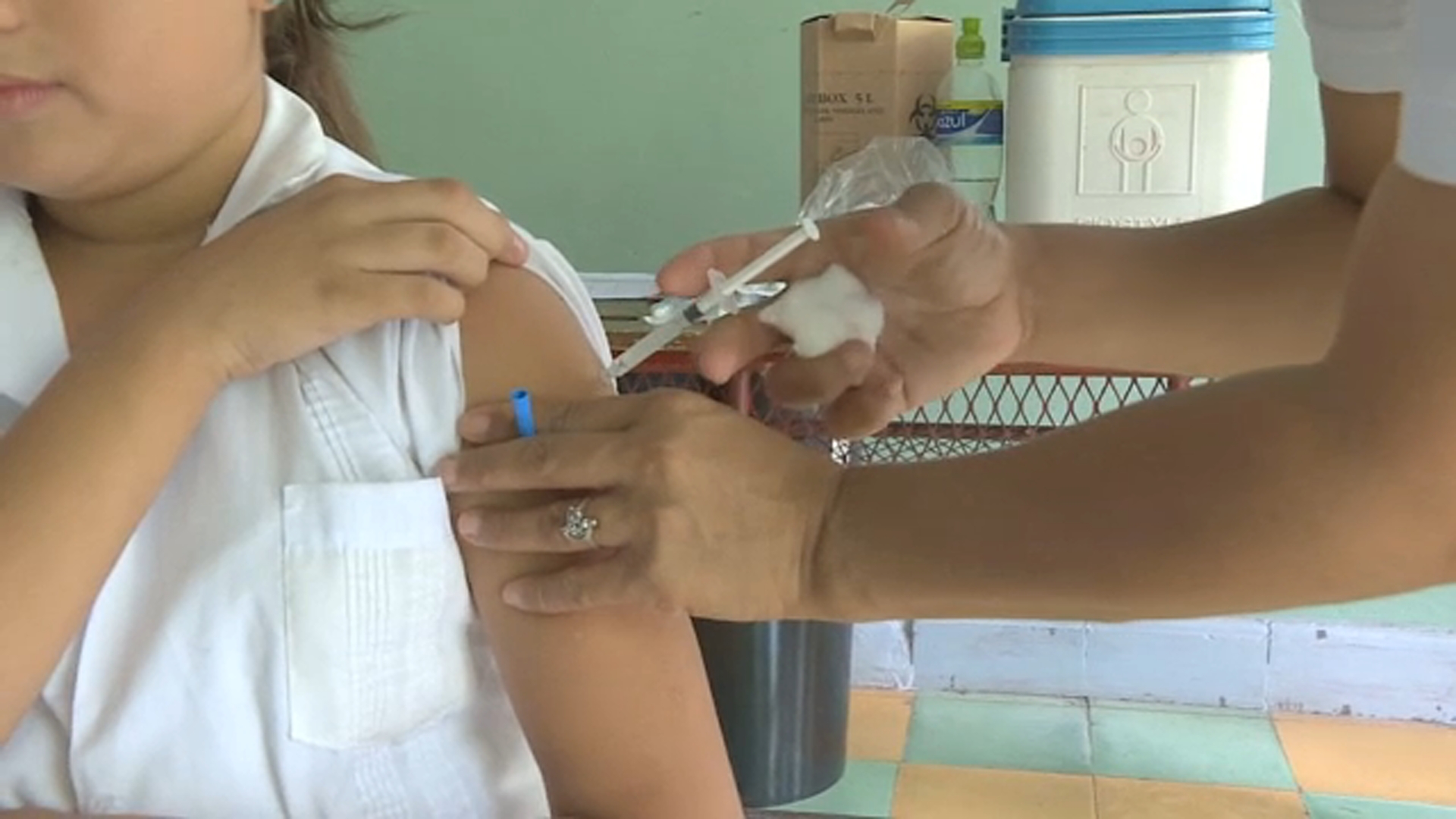 Discussing recent childhood vaccine change with Valley doctor