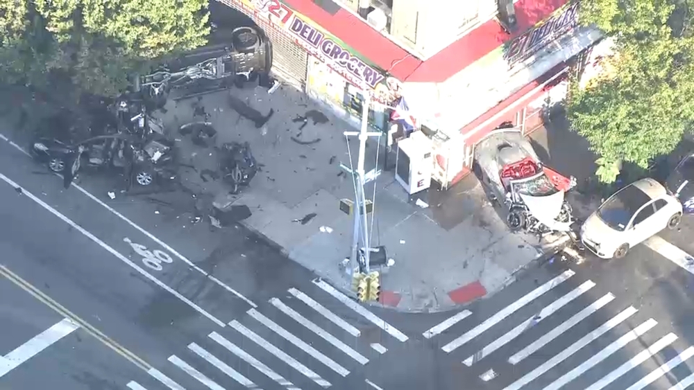 Multiple cars crash, jump curb in Inwood, critically injuring 1 person