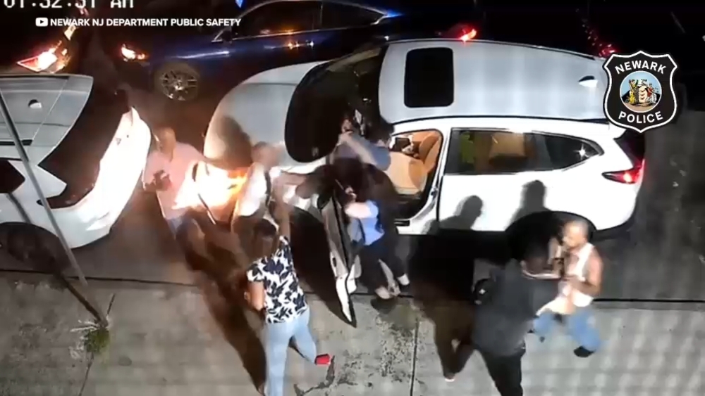 2 sought after man beaten in dispute over double-parked cars