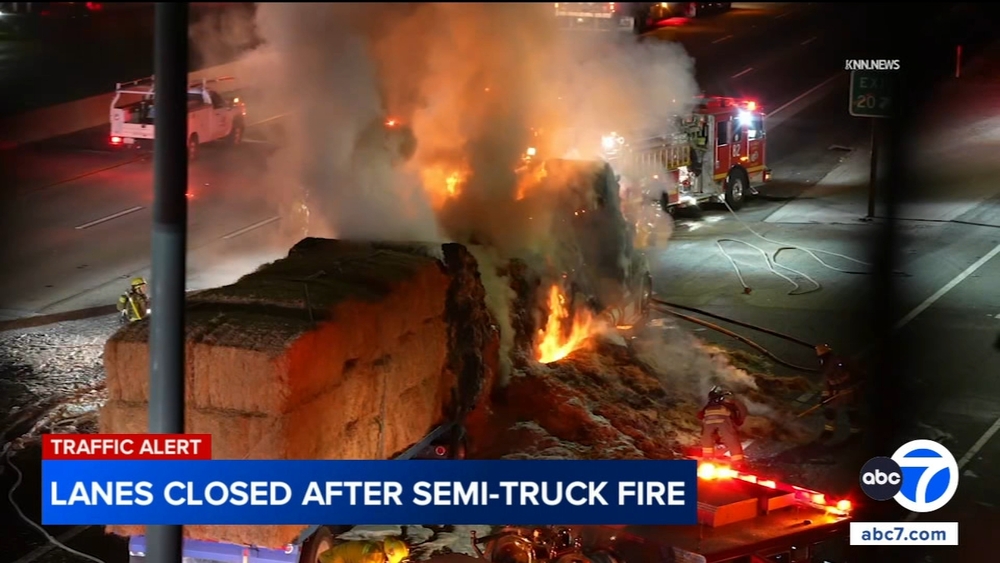 210 Fwy lanes closed after semi-truck carrying hay catches fire
