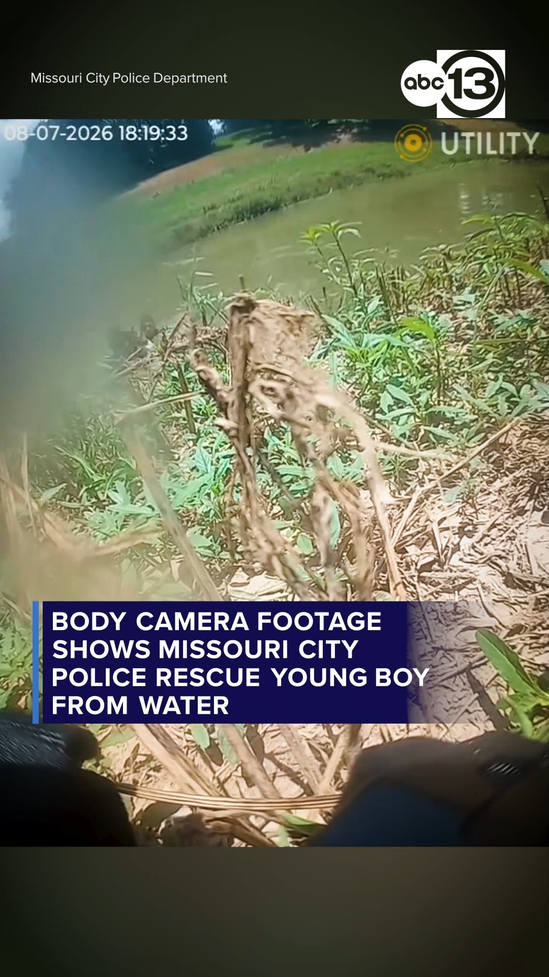 Body camera footage shows police rescue young boy from water