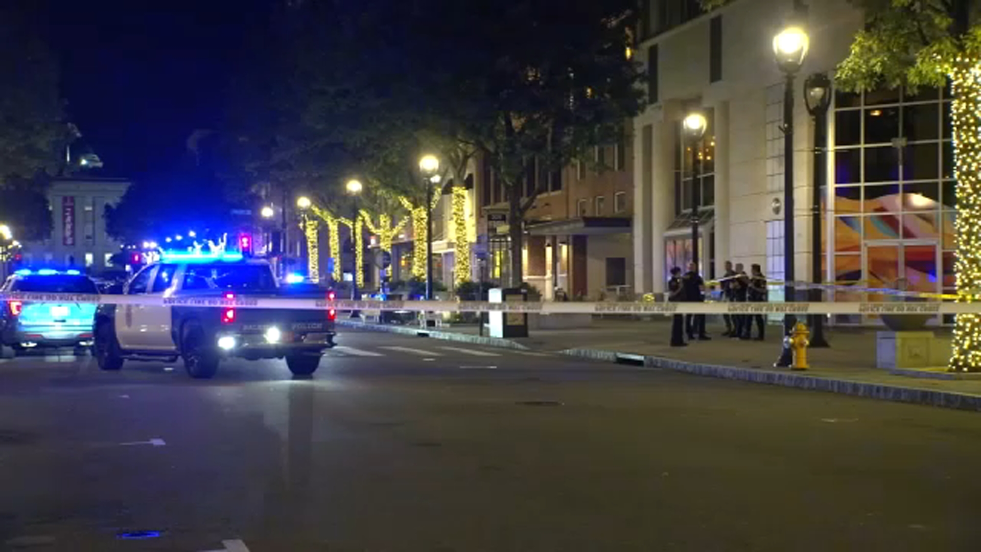 The man was standing outside the YMCA when he was shot, police said.
