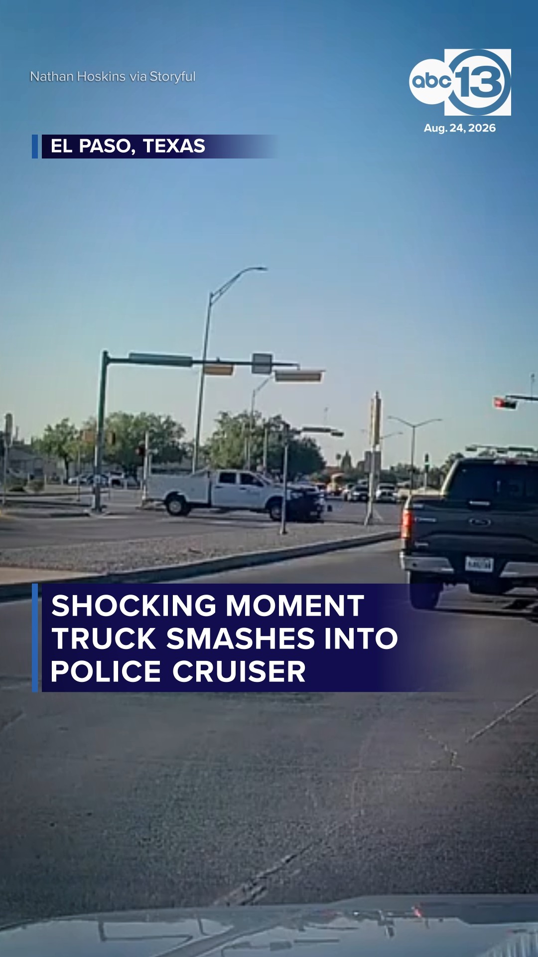 Shocking moment truck crashes into police cruiser