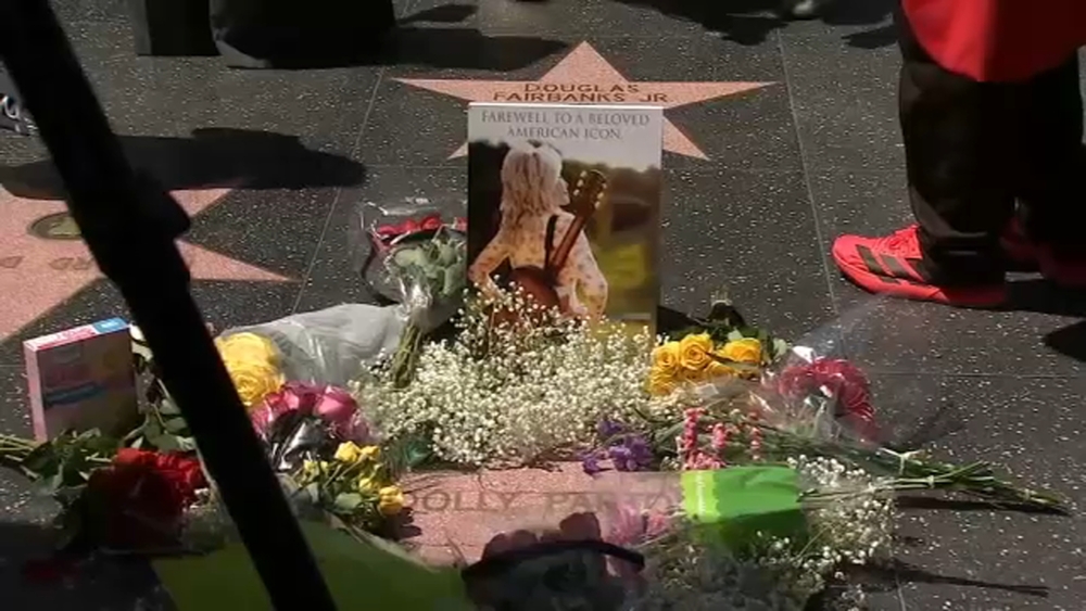 Fans gather at Dolly Parton's star, honor her lasting legacy