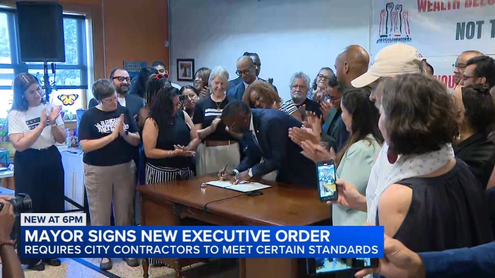 Mayor signs order requiring city contractors to meet certain standards