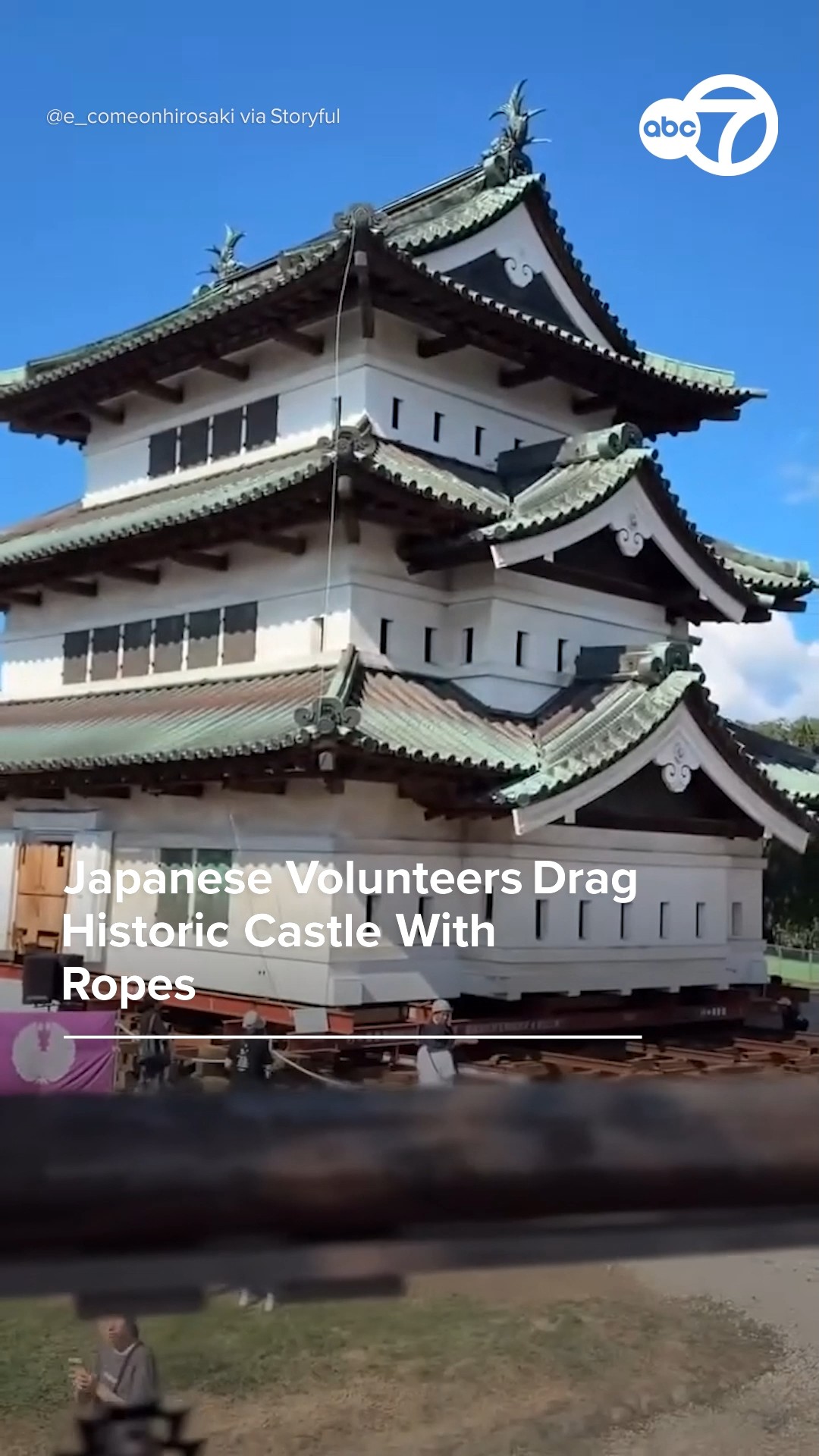 Japanese volunteers drag historic castle with ropes