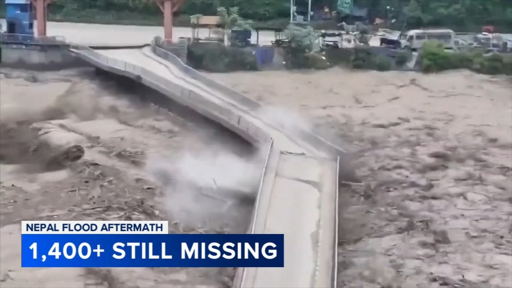 Death toll rises in Nepal-China border disaster as lake poses new flood threat