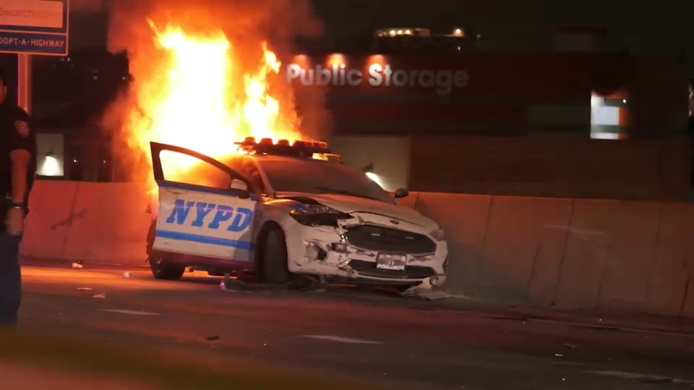 NYPD cruiser bursts into flmaes in the Bronx
