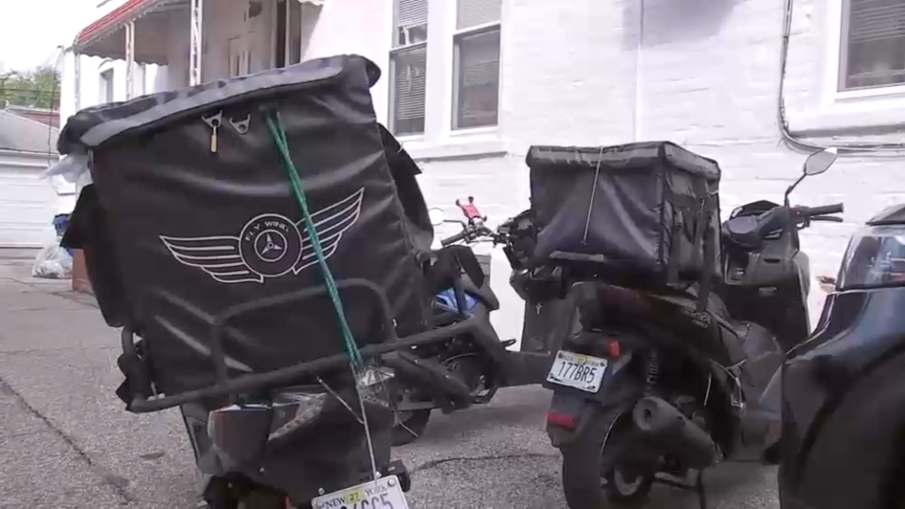 Father, son stabbed while confronting moped thieves outside Bayside home