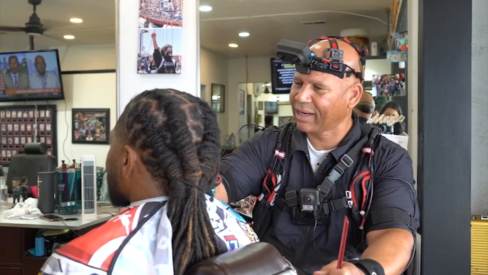 Here's why an 'old school' SJ barber is teaching robots to cut hair